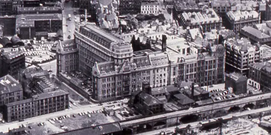 A scan of an old photograph of the aerial view over The University of Manchester campus