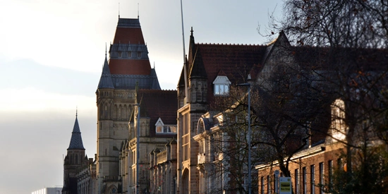 A building within The University of Manchester at dusk