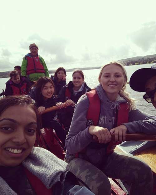 A group of students on a rowing boat at Brathay