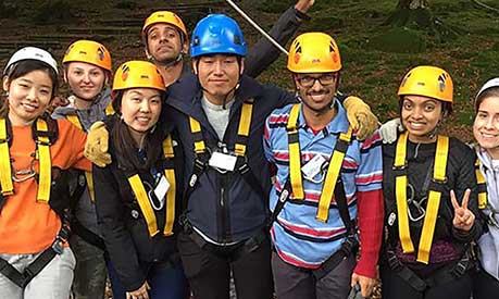 A group of students at Brathay wearing helmets and harnesses