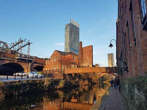 The canal running through Castlefield, with Beetham Tower in the background