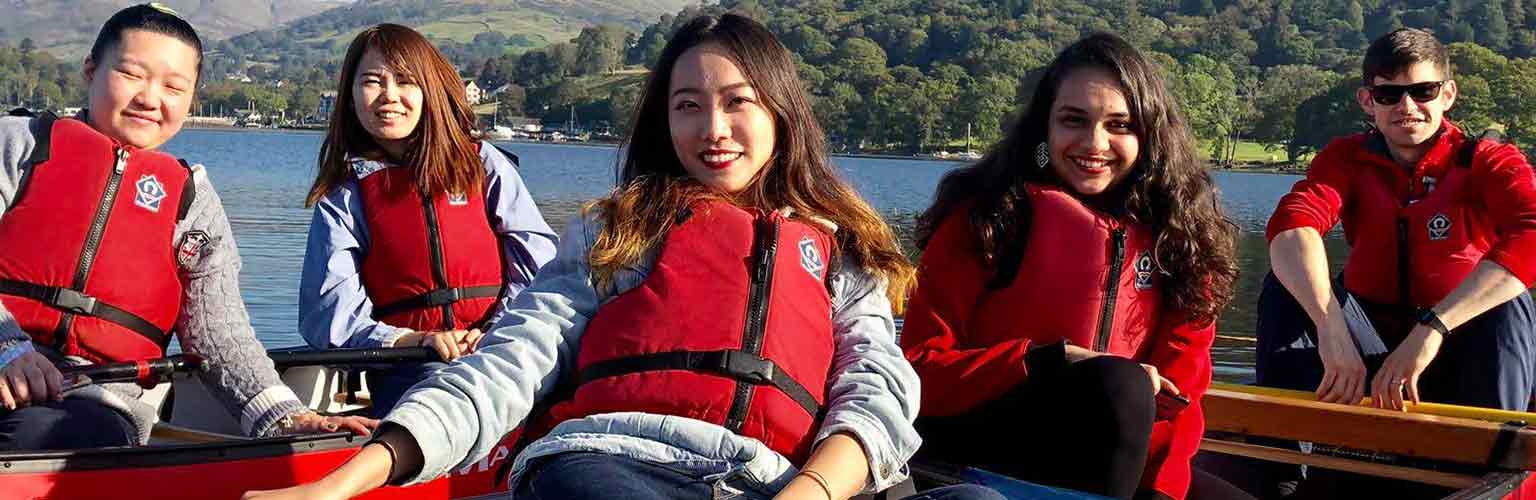 Payal Mehta and some student friends on rowing boats at Brathay in The Lake District