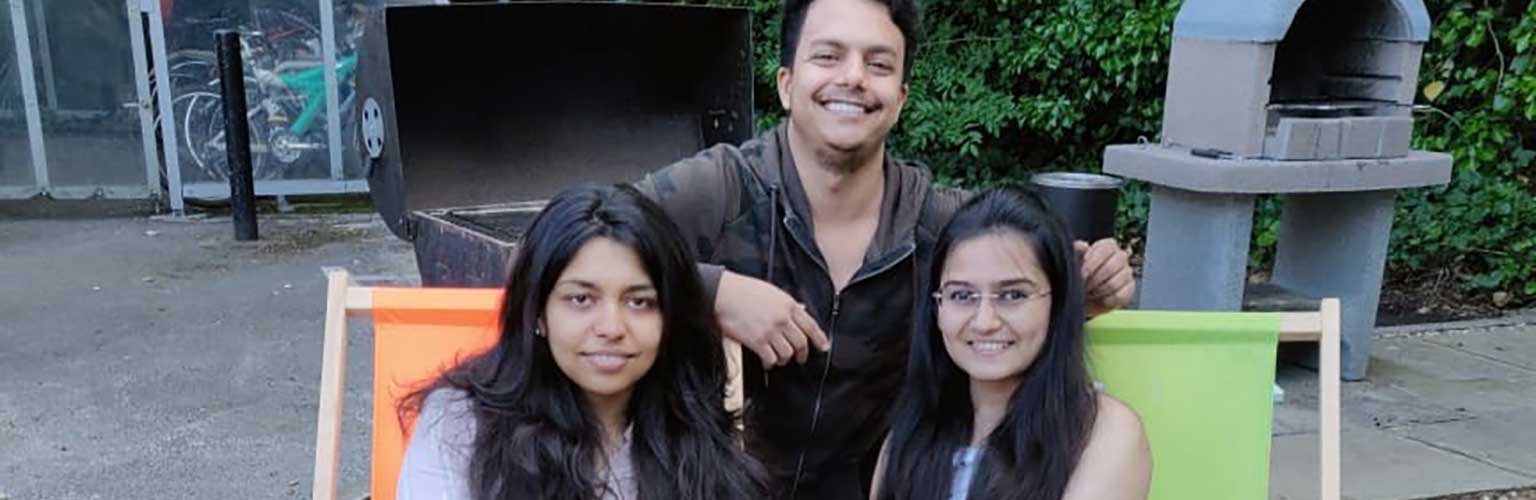 Aditi Verma sat in a deck chair with two other student friends