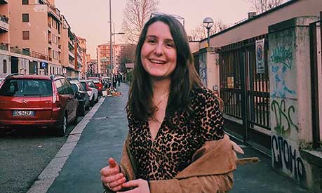 Camille Hanotte standing on a street in Milan