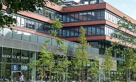 The Alliance Manchester Business School building from University Green