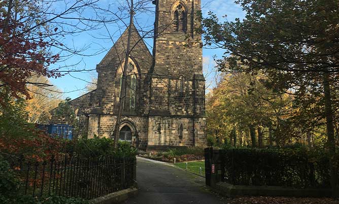 A church building with blue sky