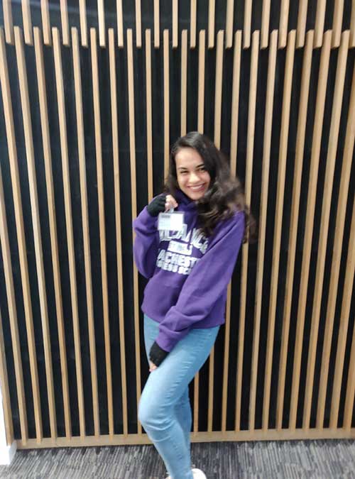 Payal Mehta wearing a purple hoodie in the Hive at Alliance MBS