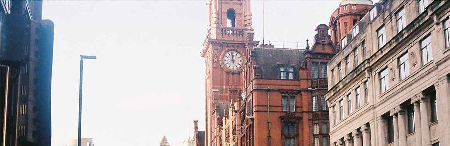 A view of Oxford Road looking towards to the city centre - showing the Kimpton Clocktower in the foreground