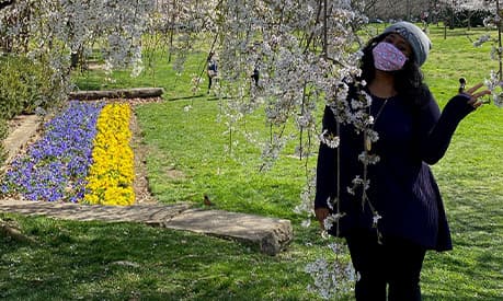 Michelle wearing a mask in a park in the USA