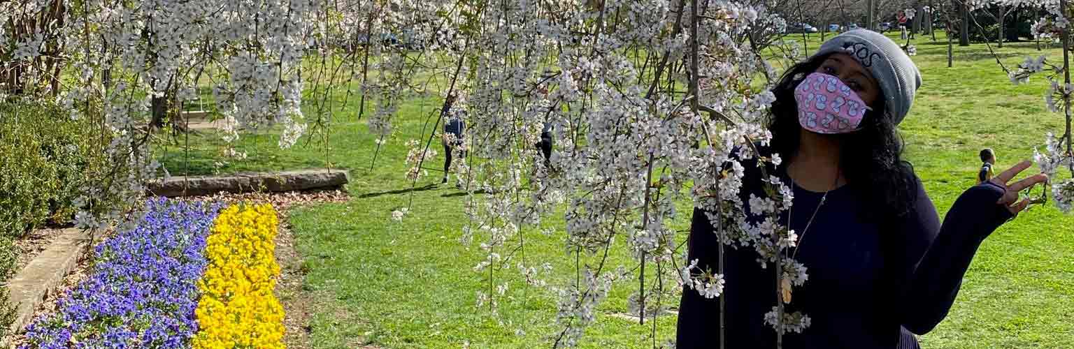 Michelle wearing a mask in a park in the USA