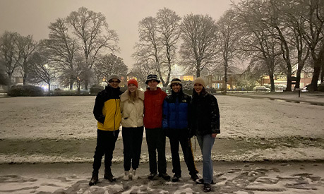 Amy Wells and her friends in a park in the snow