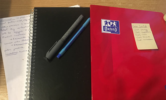 3 notepads on a desk