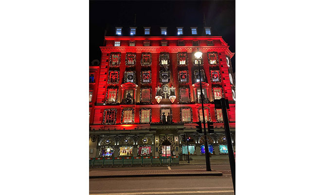 A building in Manchester light up in red