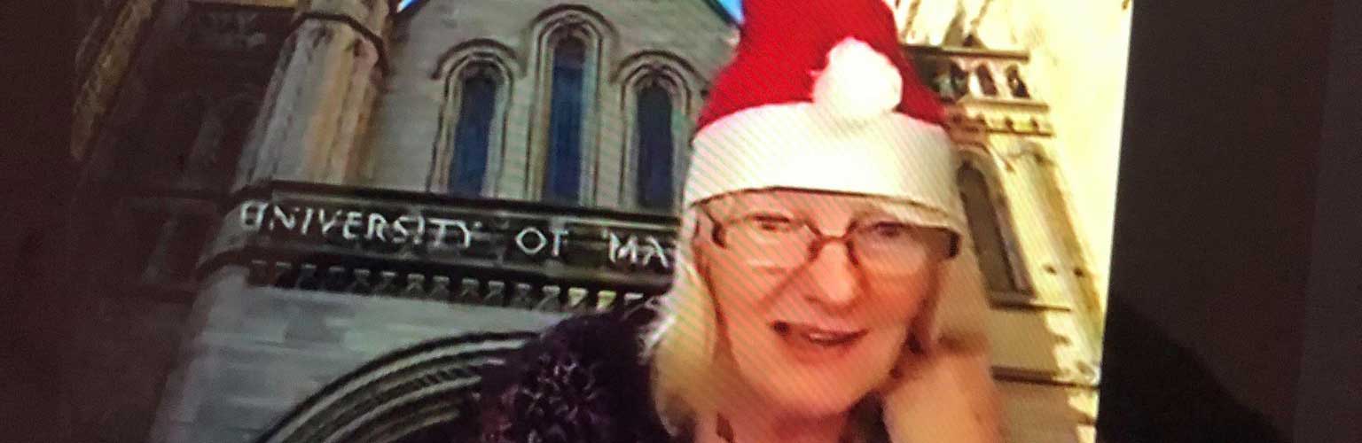a zoom call with a tutor in a santa hat