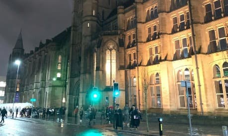 The University of Manchester at night at graduation