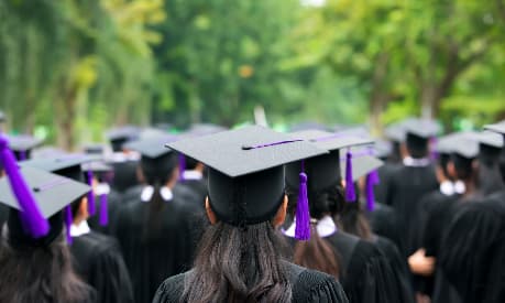 A picture of lots of graduates at their graduation ceremony