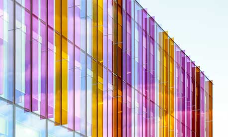 A photo of the multi-coloured glass fins above the entrance to the Alliance MBS building