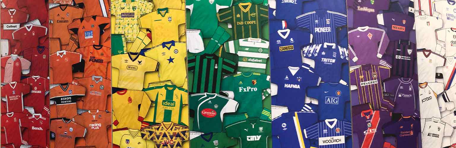 A collection of football shirts forming a rainbow colour from the national football museum