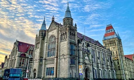 The University of Manchester Whitworth Hall with blue skies