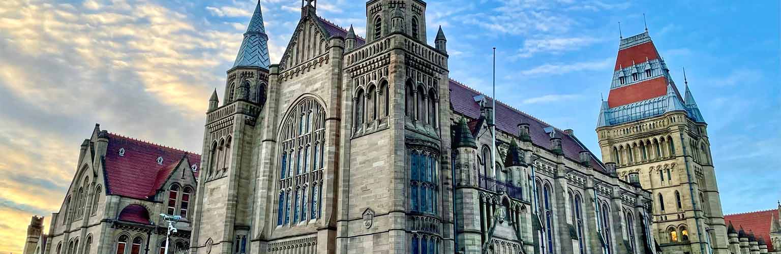 The University of Manchester Whitworth Hall with blue skies