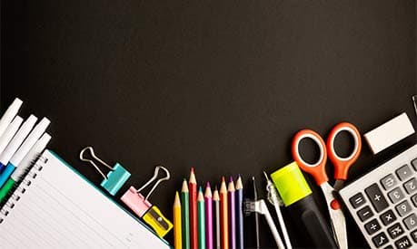 a selection of essential stationary items for exams