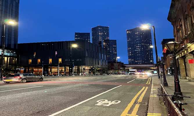 A view down Deansgate in Manchester at night time