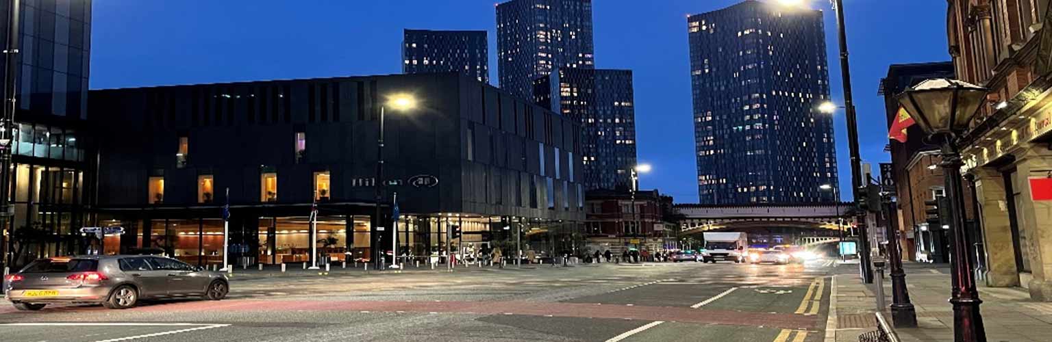 A view down Deansgate in Manchester at night time