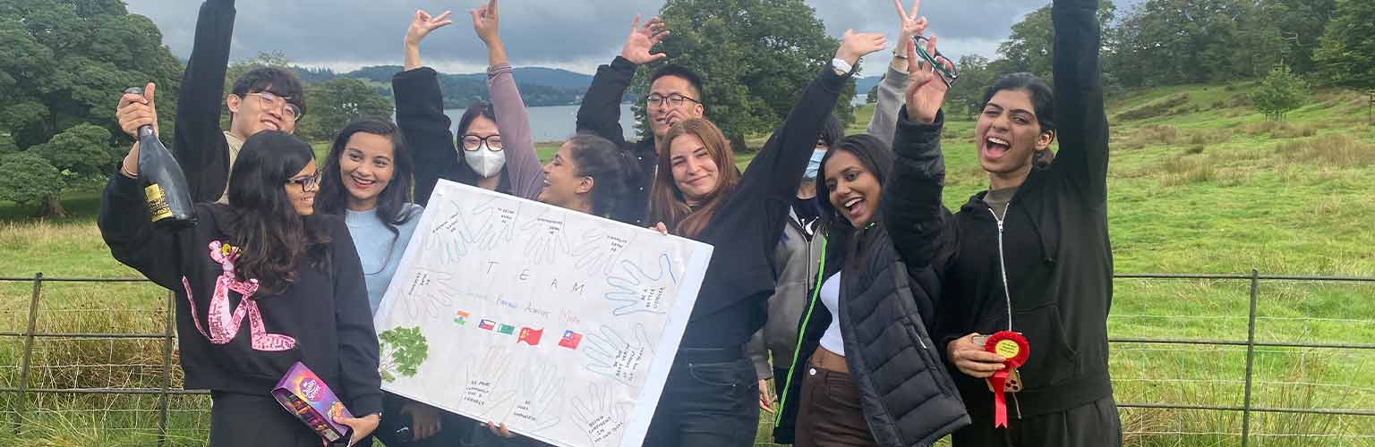 Eleni Chliapa and her friends outside celebrating in the Lake District