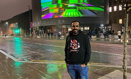 Muhammad Uneeb Altaf outside University Place at night