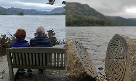 A picture of a couple looking out across the Lake District