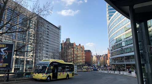 The street looking down from Manchester Piccadilly train station