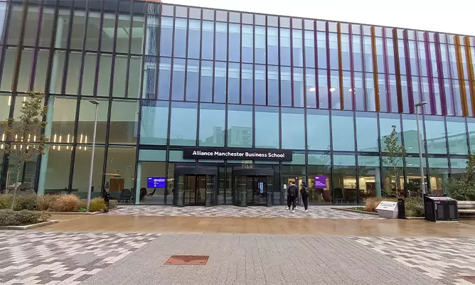 The Alliance Manchester Business School building during overcast conditions
