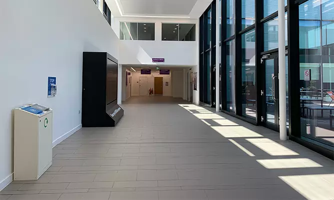 A view inside the Alliance Manchester Business School building. The view is of the courtyard on level 2.
