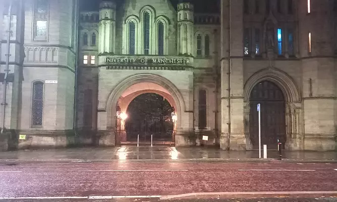 The University of Manchester arch at night