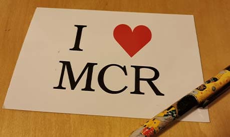 A card which says 'I love MCR' on