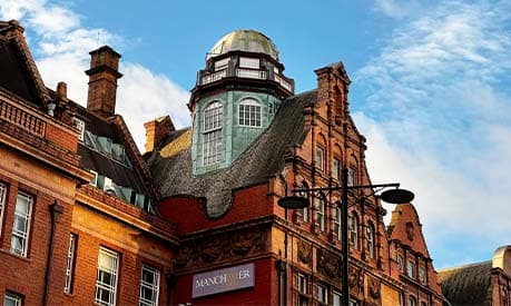 A building at the University of Manchester with a dome on the roof