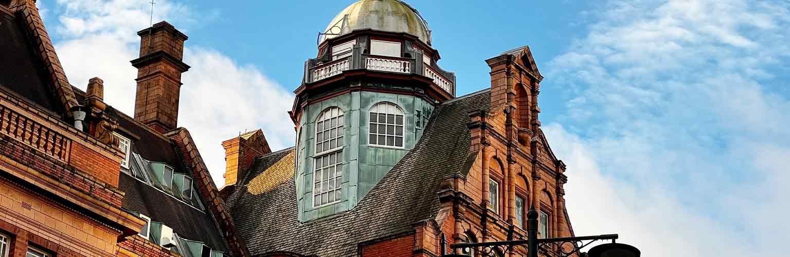 A building at the University of Manchester with a dome on the roof