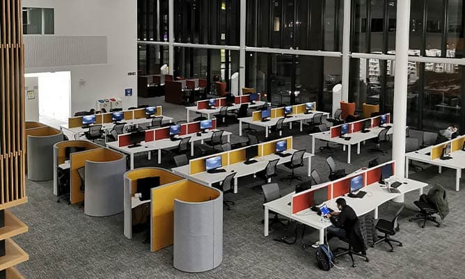 The Eddie Davies Library at Alliance Manchester Business School at night