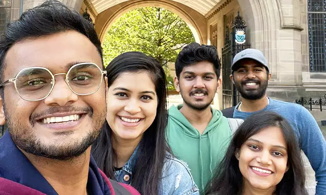 Rishwin Barasia and his friends outside the University of Manchester