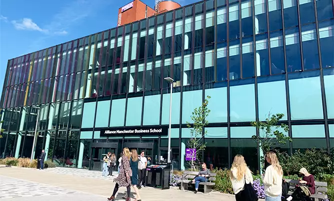 The Alliance Manchester Business School building in the sunshine