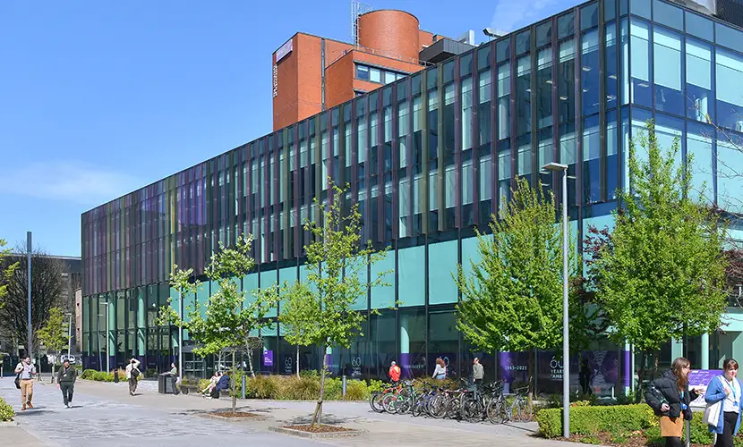 Alliance MBS building entrance on a blue sky day.