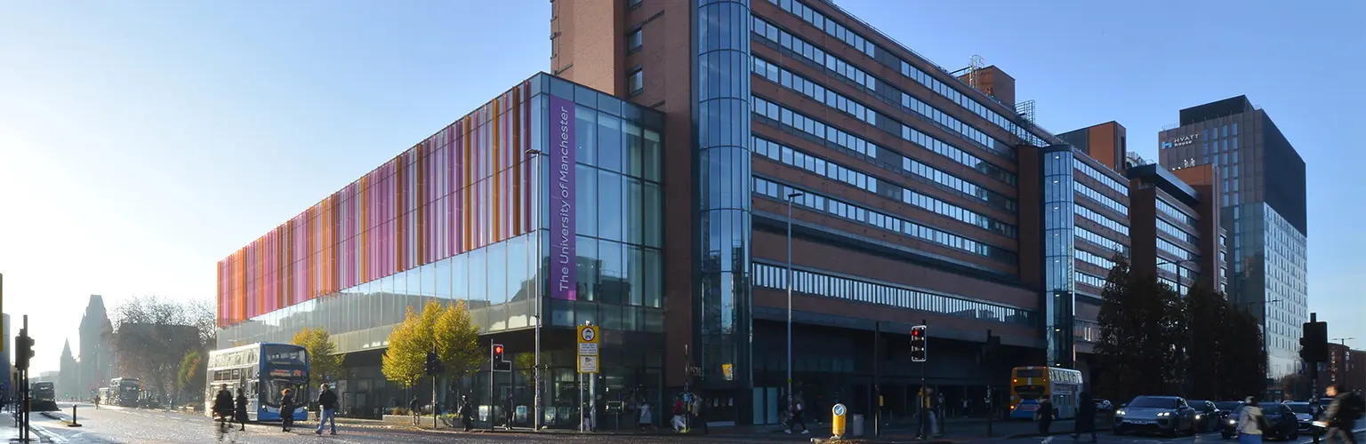 Alliance MBS building taken from Oxford Road on a blue sky day.