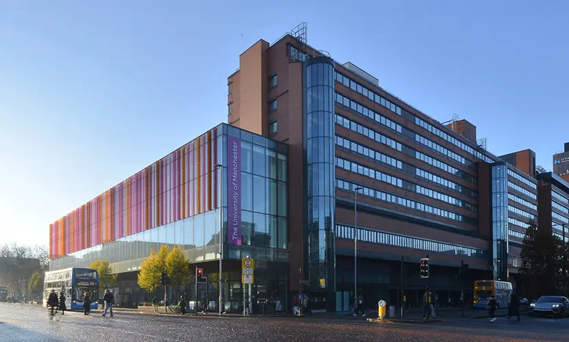 Alliance MBS building taken from Oxford Road on a blue sky day.