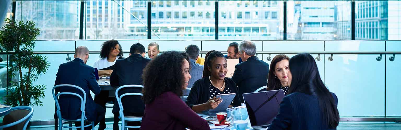 business meeting in a glass building office