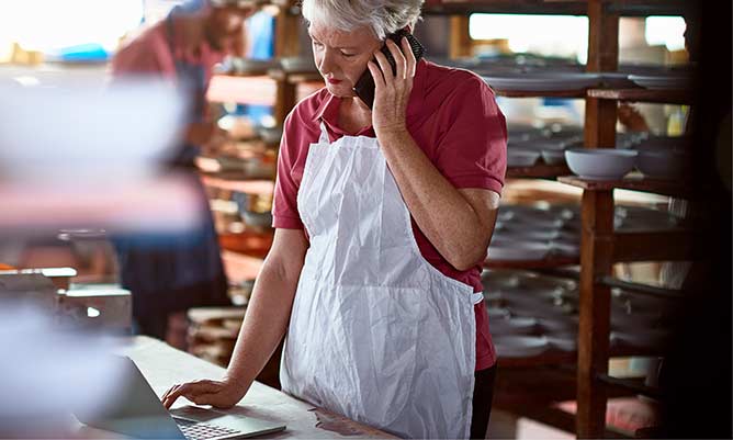 woman working in small factory