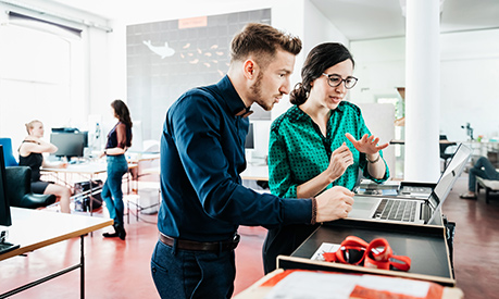 entrepreneurs-working-with-a-laptop