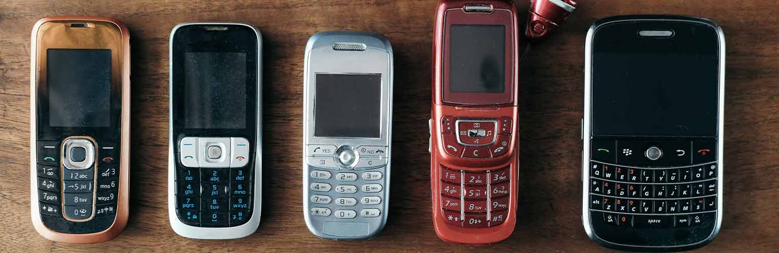 a collection of old mobile phones