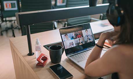 Laptop displaying a webinar