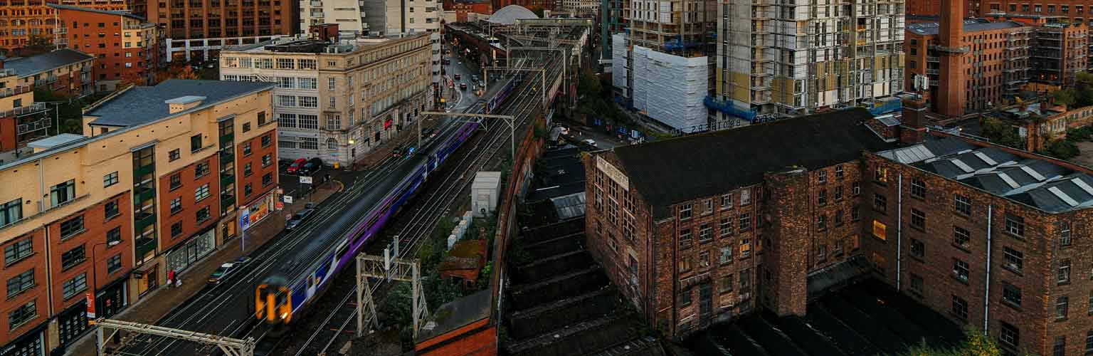 train speeding through manchester