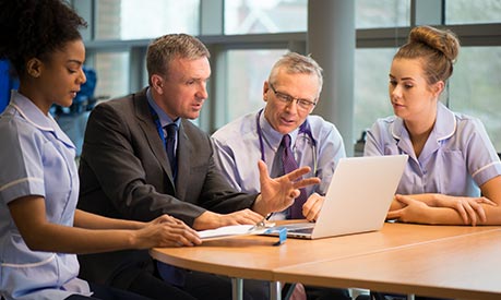 nhs staff in a meeting